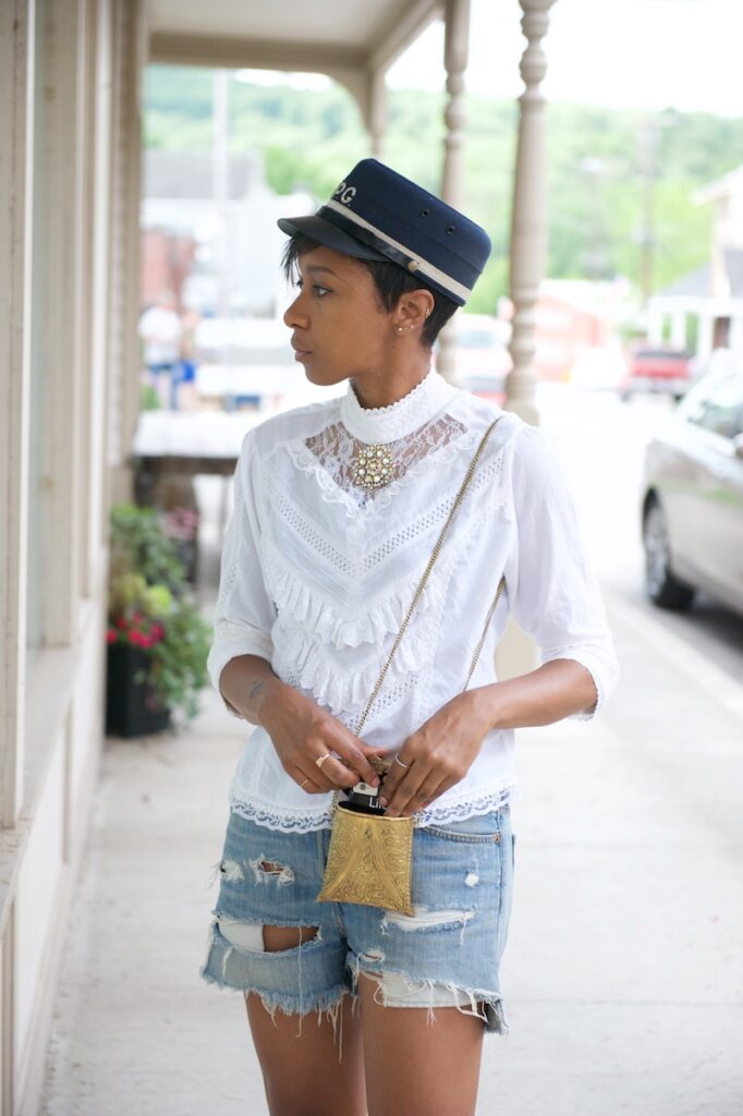 miltary hat, metal purse, metal bag