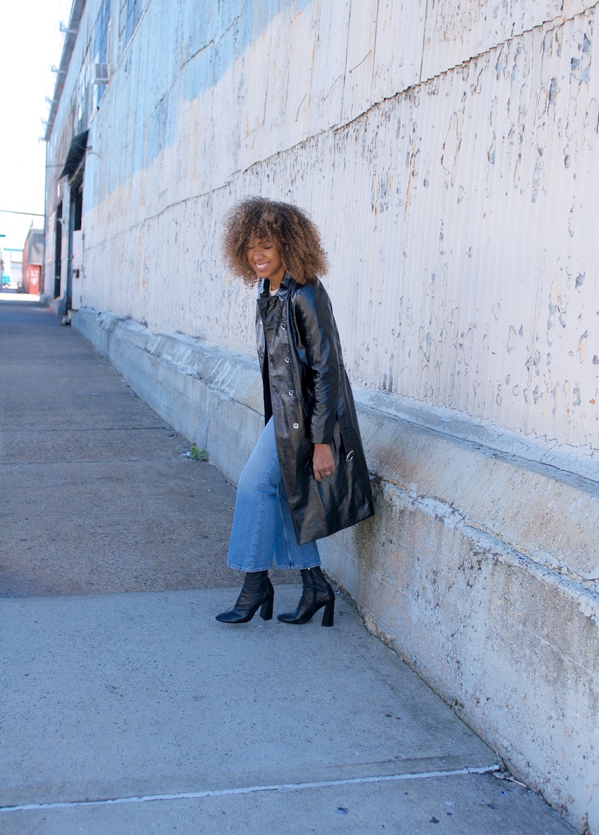 PVC PU Alexa Chung trench coat with block heel ankle boots and cropped denim jeans