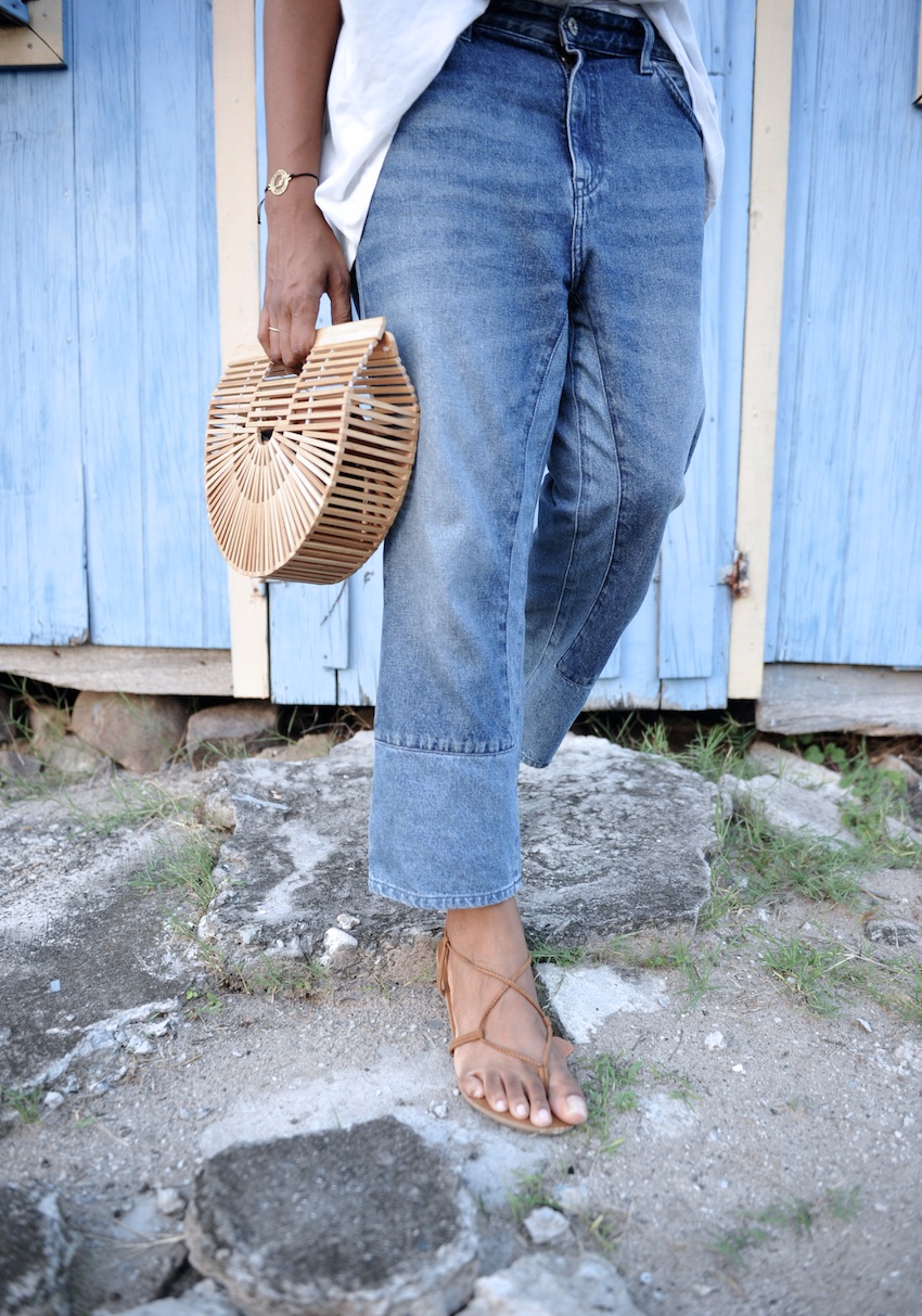 Cult Gaia bag with a wide leg denim jeans