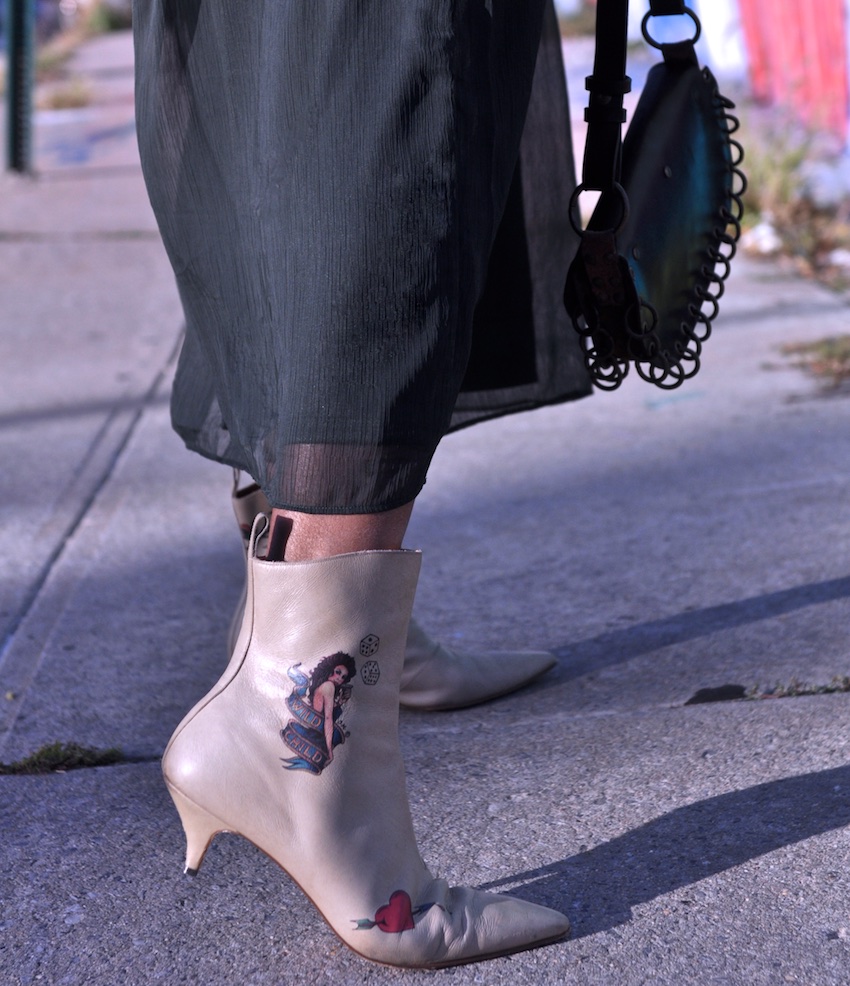 white ankle boots with tattoo design