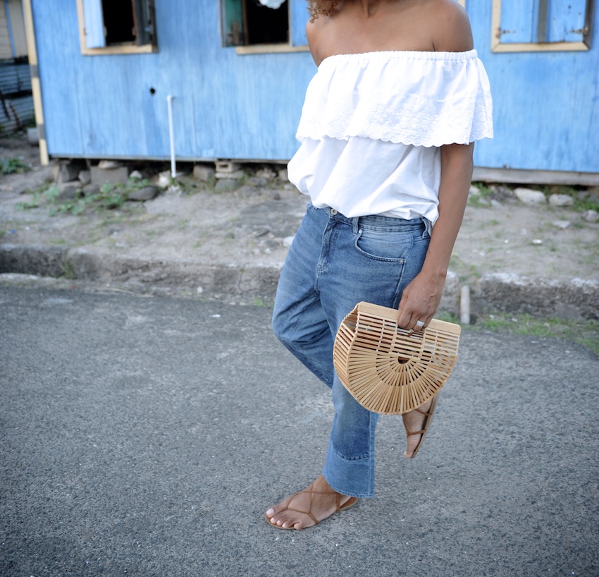 Karen Blanchard wearing the Cult Gaia ark bag with gladiator sandals