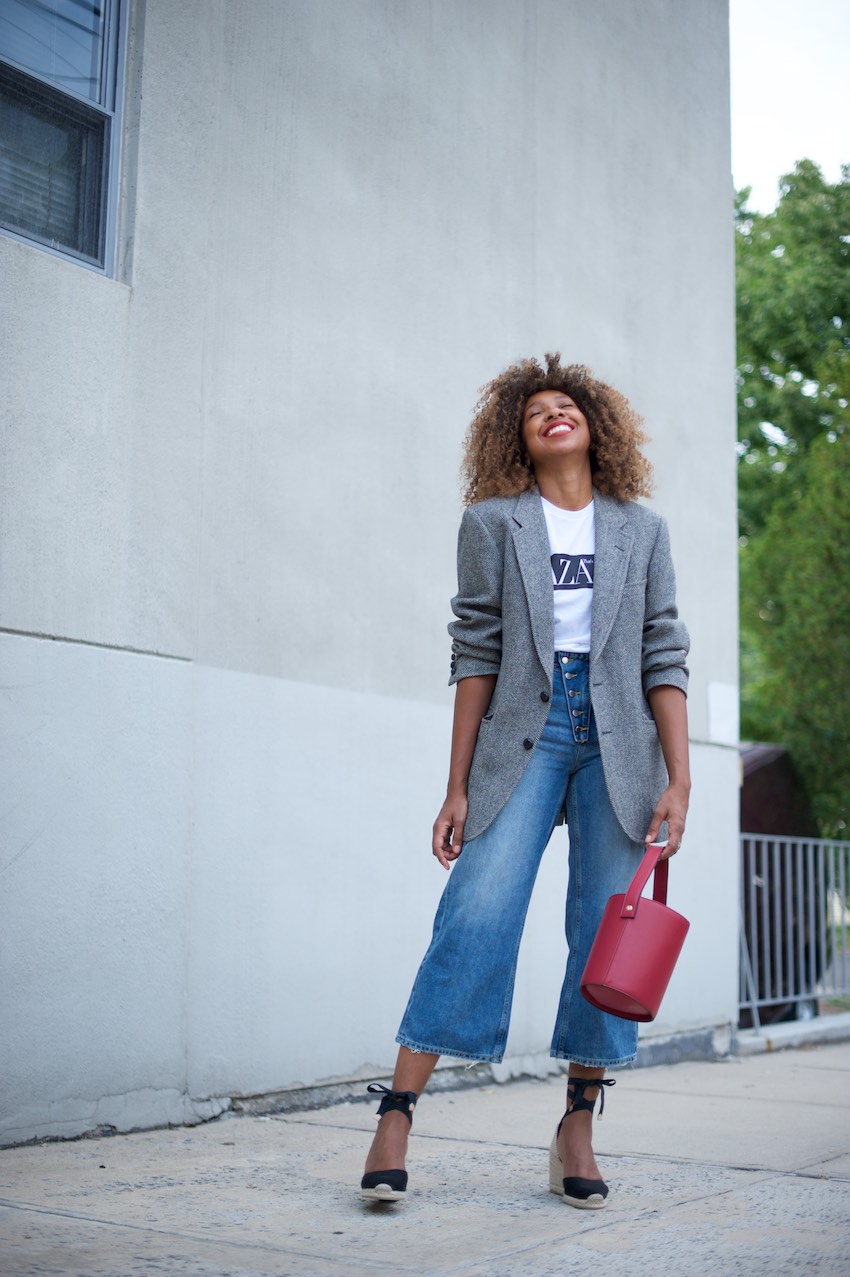 Karen Blanchard wearing zara wide leg jeans and a grey checked blazer