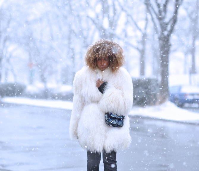 Karen Blanchard the fashion blogger wearing a mongolian fur coat and free people snake print boots