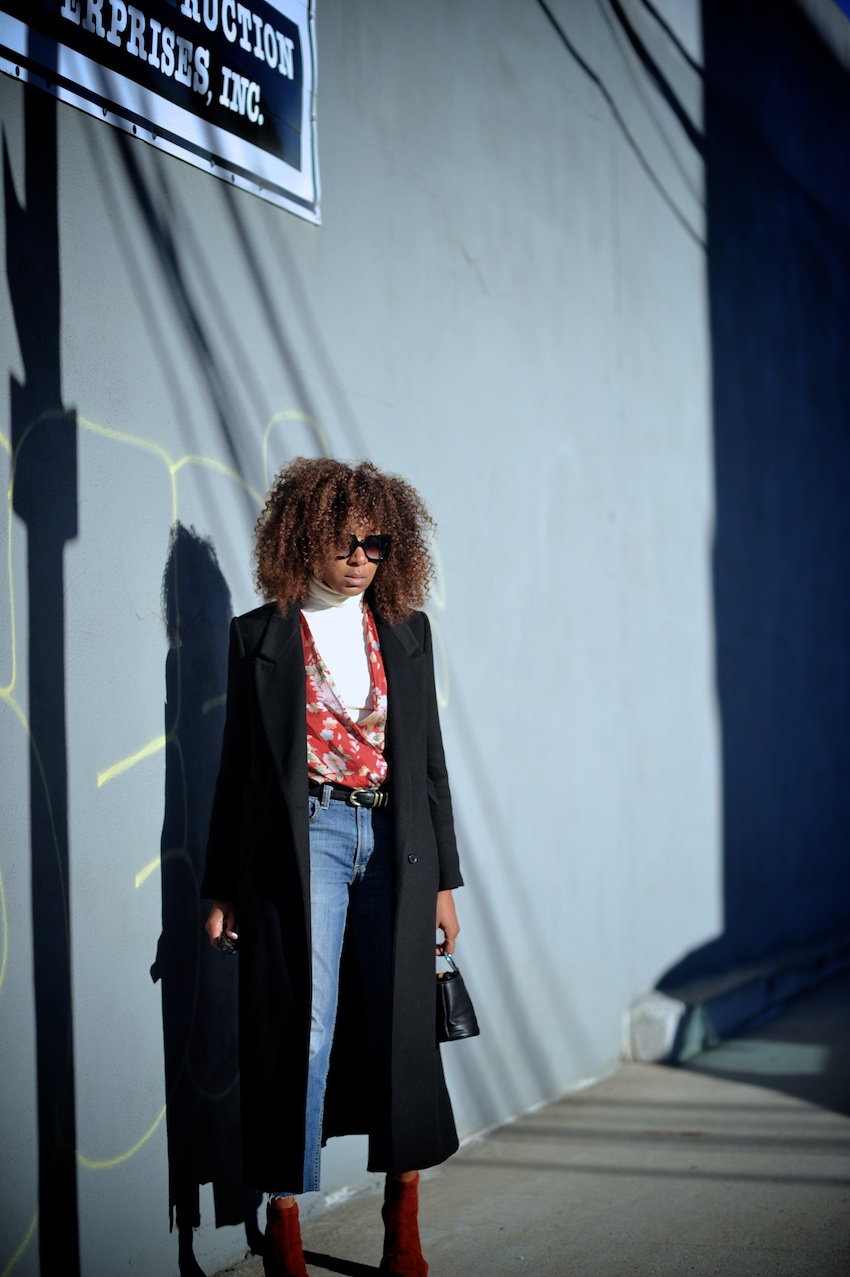 karen blanchard the fashion blogger wearing an H&M long black coat with Levi vintage jeans and Zara red suede kitten heel boots