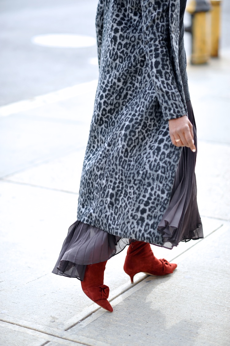 Karen Blanchard wearing a leopard print coat