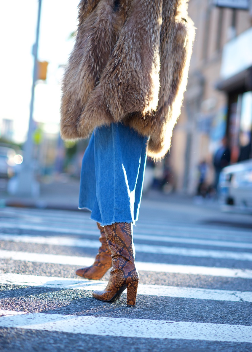 Knee high snake print boots