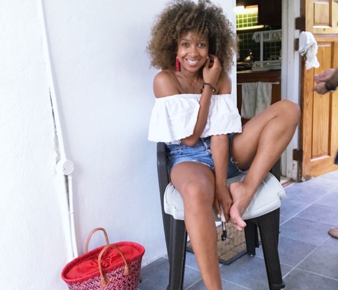 karen blanchard the fashion blogger wearing a white off the shoulder ruffle blouse