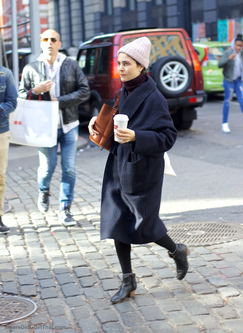 black ankle boots with brown leather bag and black wool coat